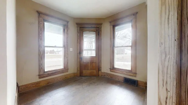 an empty room with windows