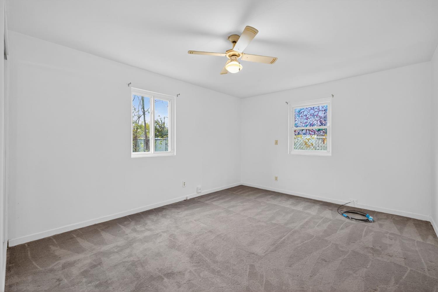 2812 Plover Street Sacramento, CA 95815 - Photo 21 of 40 a view of an empty room with a window
