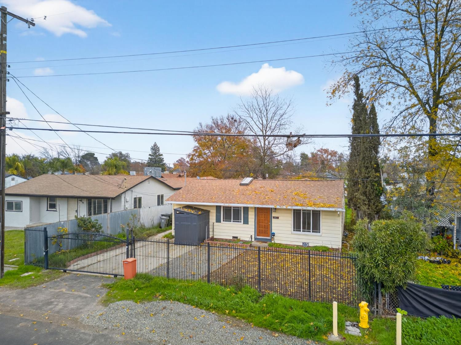 2812 Plover Street Sacramento, CA 95815 - Photo 3 of 40 a front view of a house with a yard and potted plants