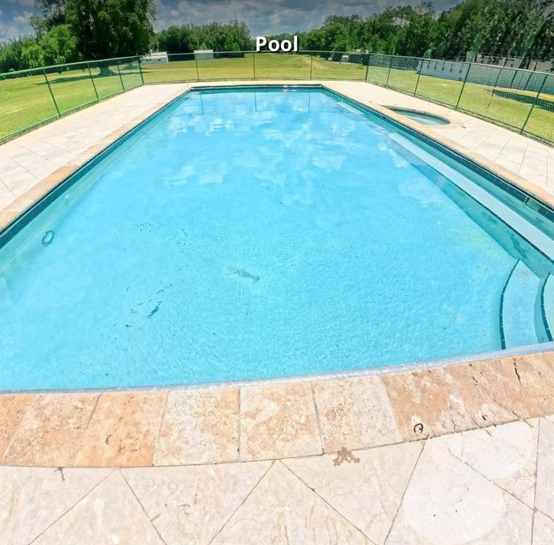 7390 South Mc Alpin Road McAlpin, FL 32062 - Photo 38 of 53 a view of a swimming pool and outdoor space