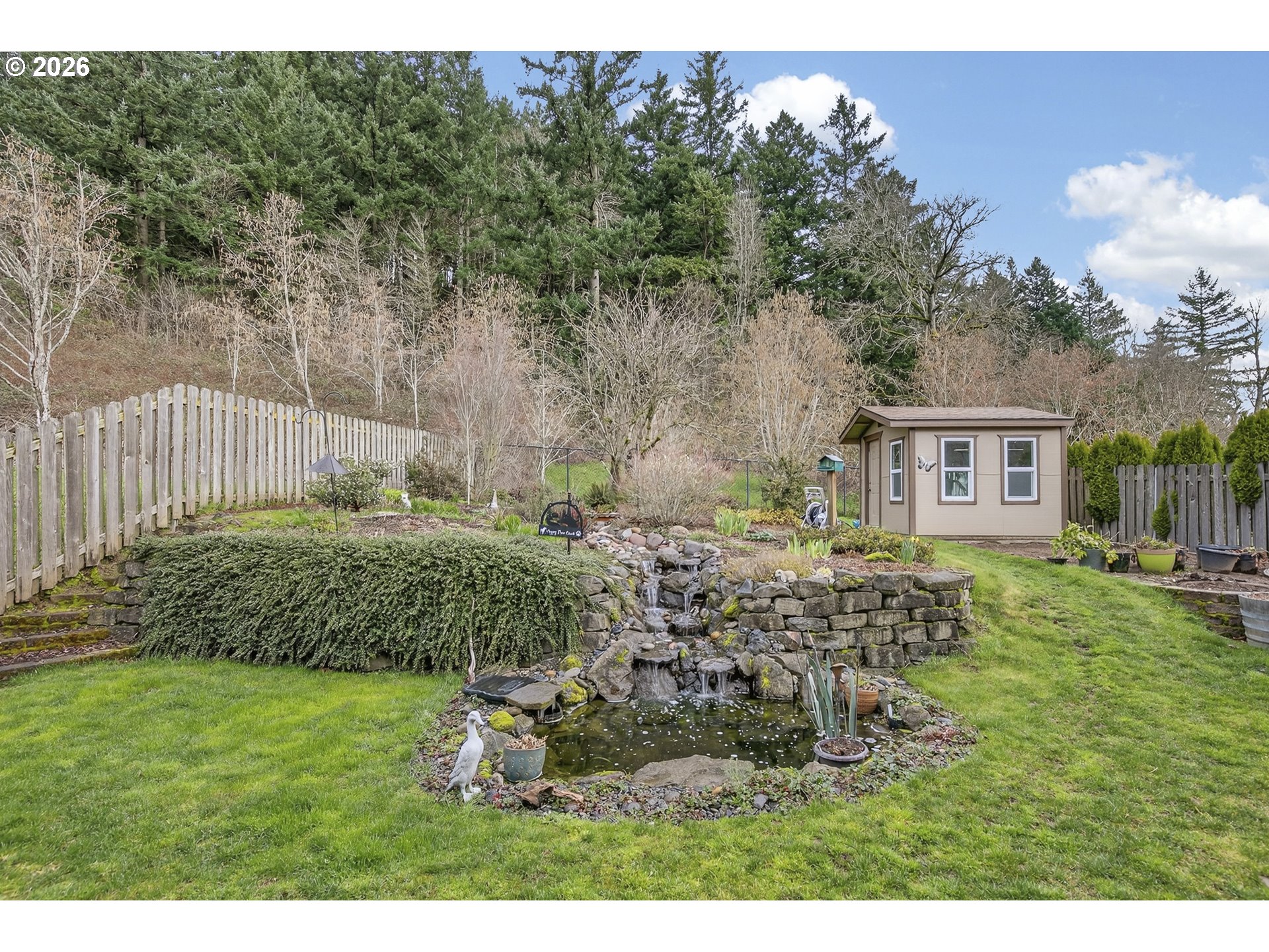 163 Southwest Sandlewood Loop Gresham, OR 97030 - Photo 7 of 47 a view of backyard of house with green space