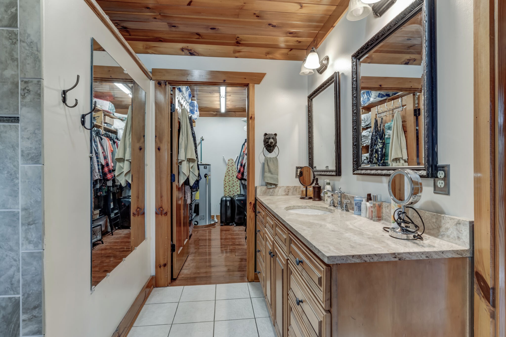 6743 Bethlehem Road Springfield, TN 37172 - Photo 22 of 56 a bathroom with a granite countertop sink a mirror and shower
