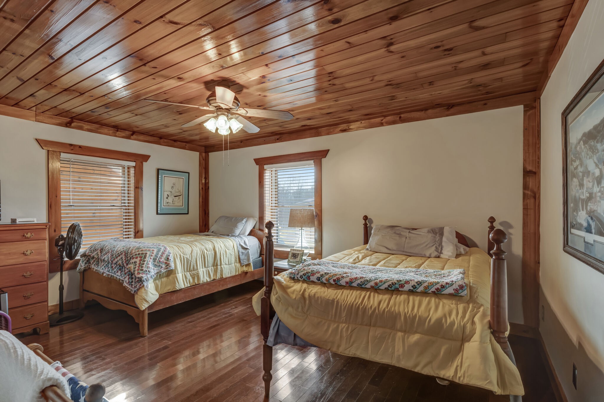 6743 Bethlehem Road Springfield, TN 37172 - Photo 29 of 56 a bedroom with a bed and a chandelier