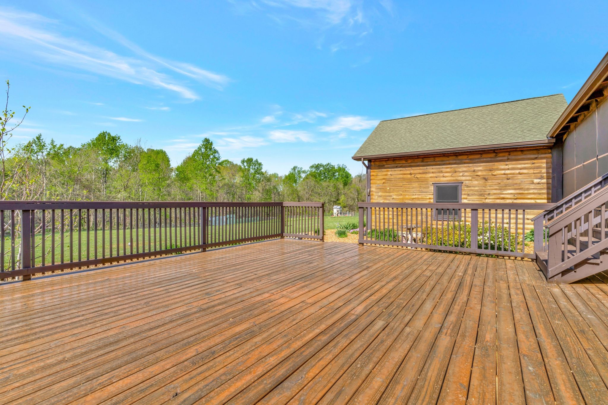 6743 Bethlehem Road Springfield, TN 37172 - Photo 41 of 56 a view of a balcony with wooden floor and fence