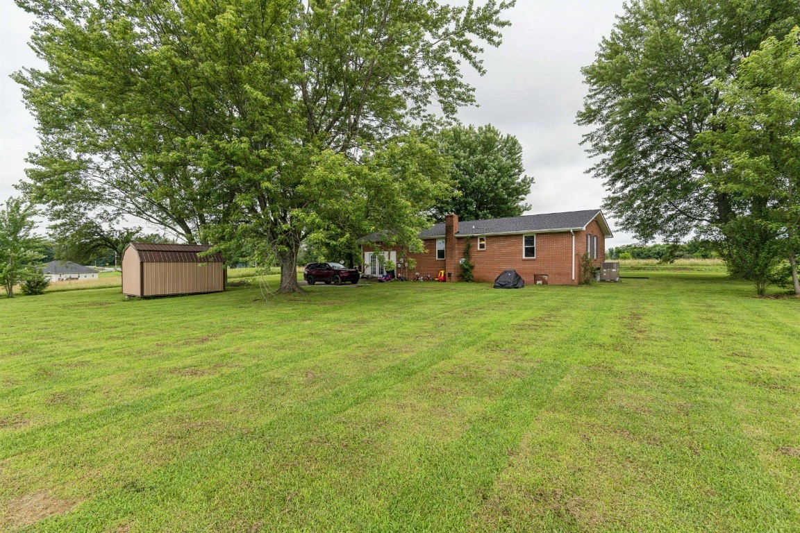 330 Union Camp Road Lafayette, TN 37083 - Photo 3 of 25 a house view with a garden space