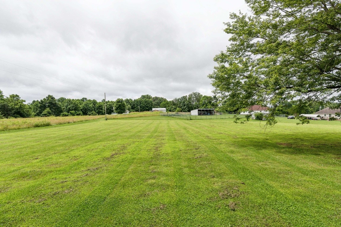 330 Union Camp Road Lafayette, TN 37083 - Photo 5 of 25 a view of a lake with a big yard