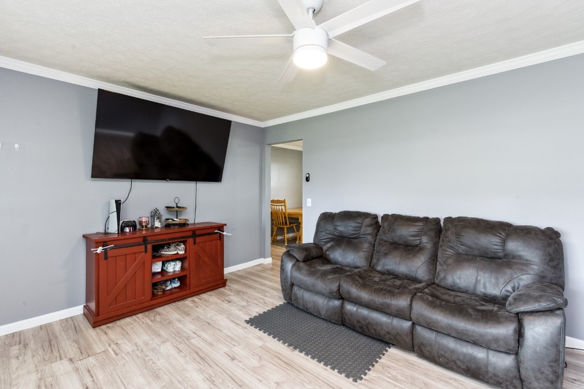 330 Union Camp Road Lafayette, TN 37083 - Photo 7 of 25 a living room with furniture and a flat screen tv