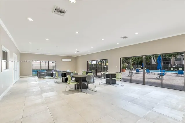 a view of a dining area with furniture window and outside view