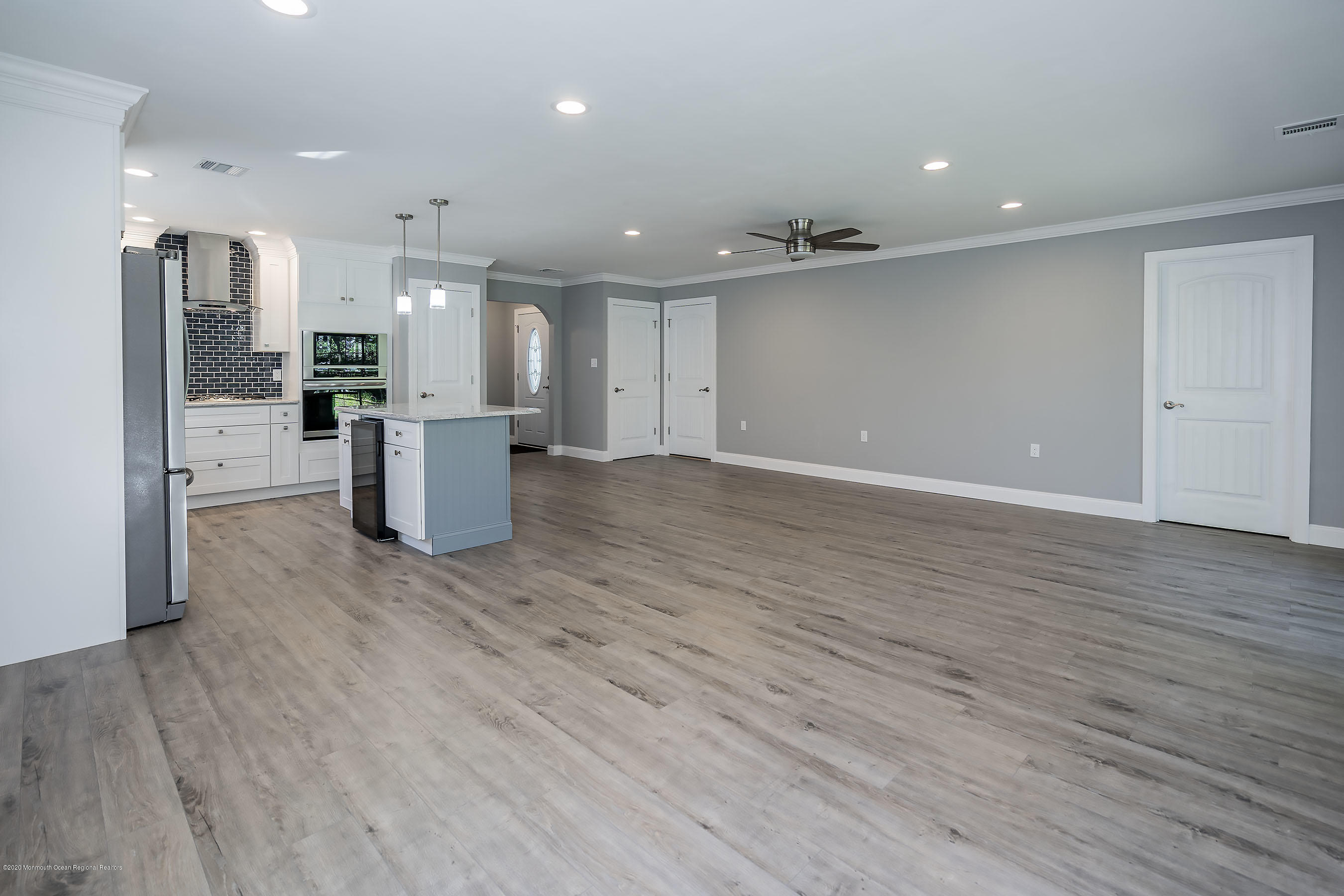 65 Markham Road Brick, NJ 08724 - Photo 12 of 27 a view of a kitchen with refrigerator and wooden floor