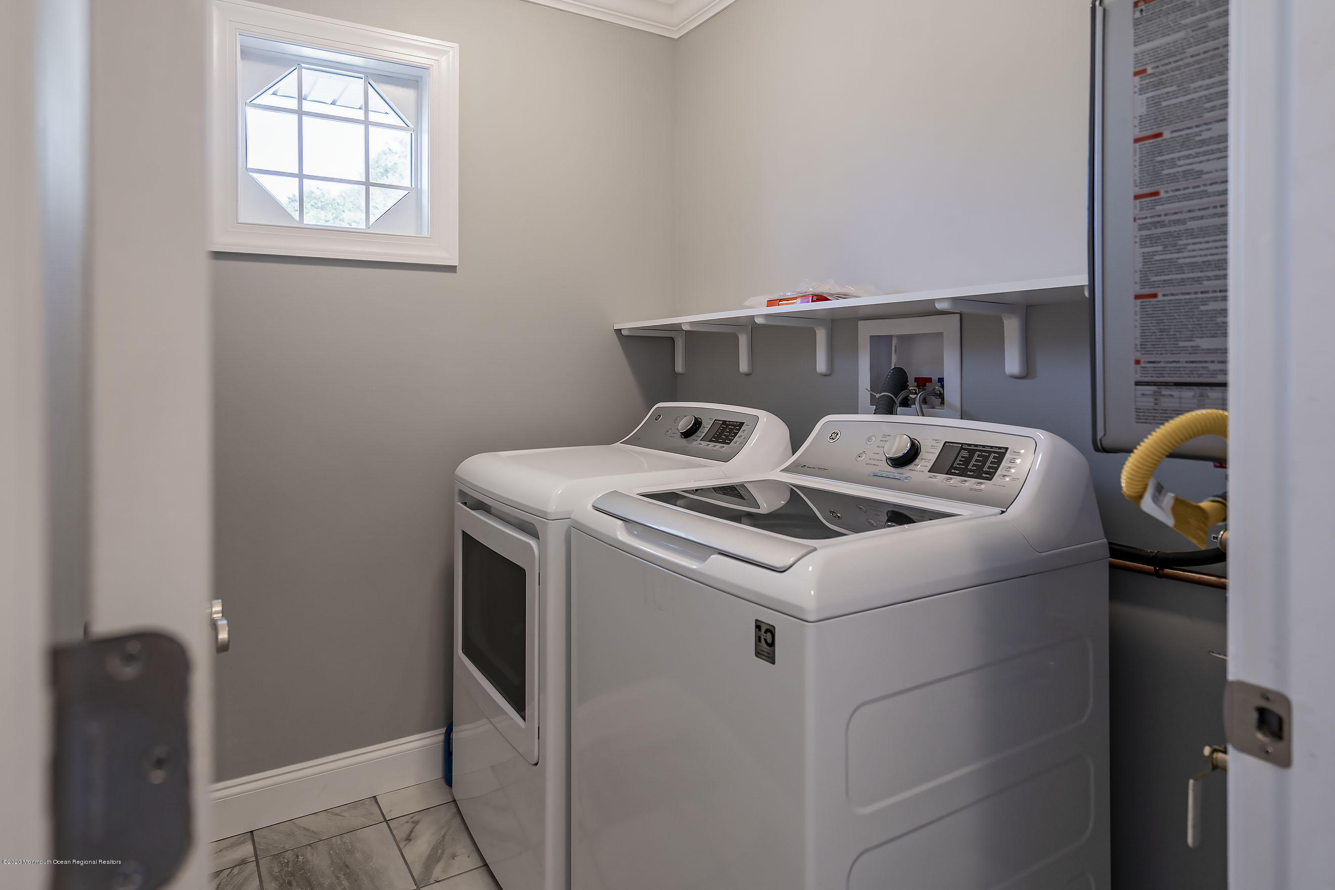 65 Markham Road Brick, NJ 08724 - Photo 16 of 27 a utility room with dryer and washer