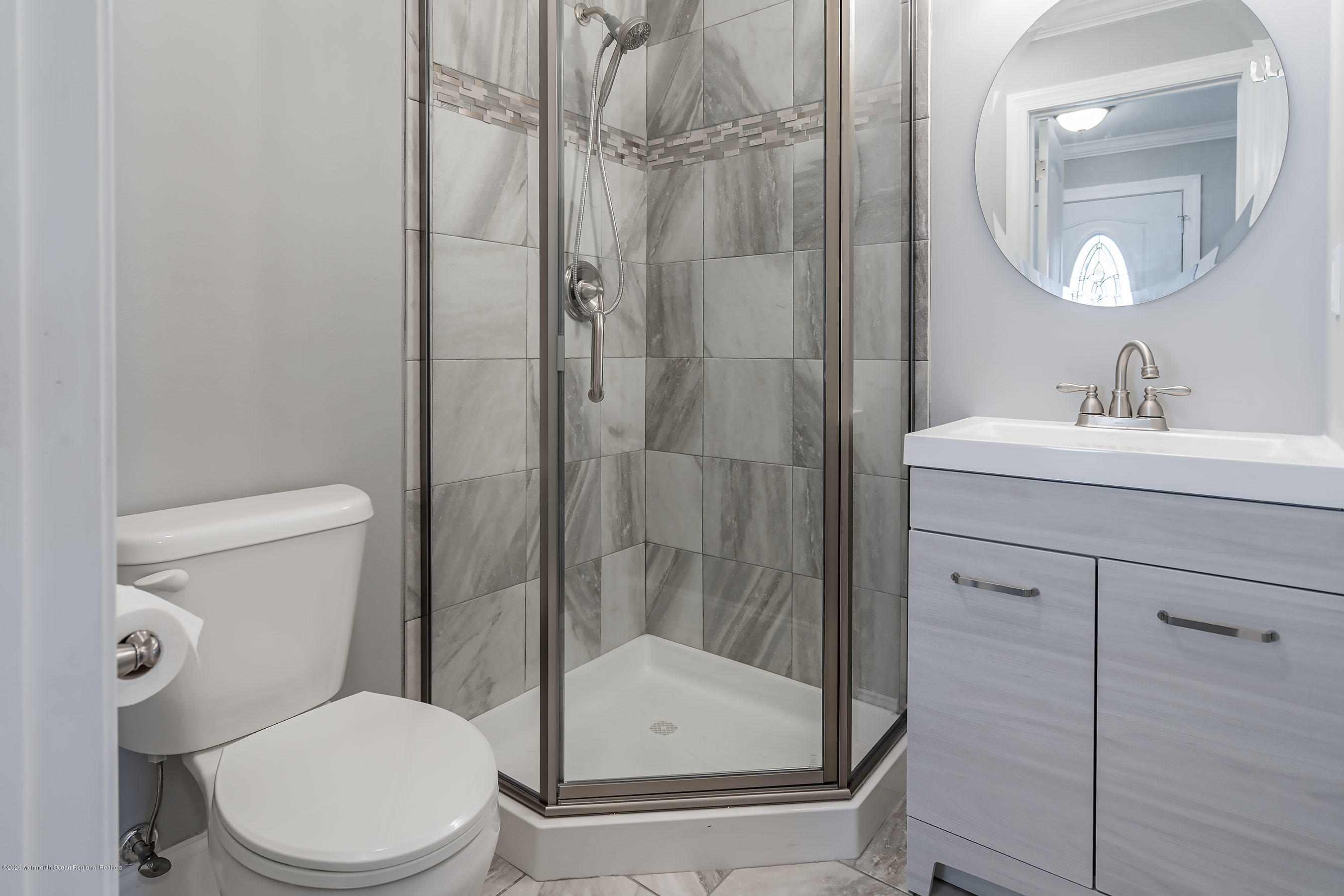 65 Markham Road Brick, NJ 08724 - Photo 18 of 27 a bathroom with a toilet a sink and shower