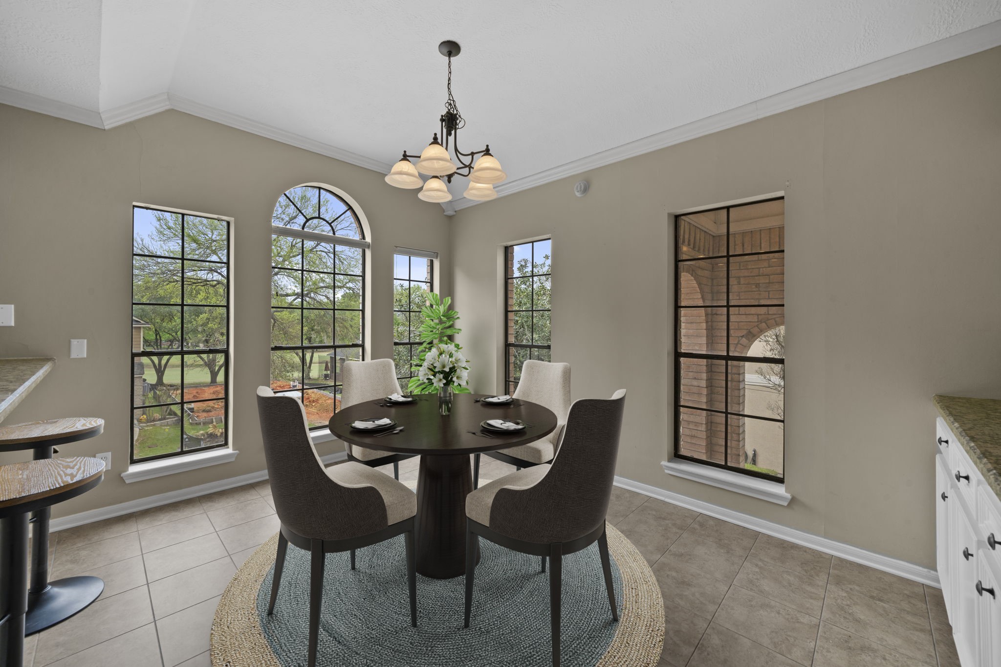 169 April Cove Montgomery, TX 77356 - Photo 20 of 39 Virtually Staged: It is bright and inviting surrounded by large windows that fill the space with natural light and showcase beautiful outdoor views.