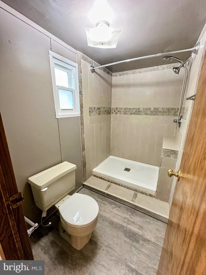 19 Gordon Drive Dover, DE 19901 - Photo 14 of 19 a bathroom with a toilet a sink and a shower