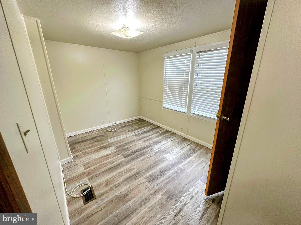 19 Gordon Drive Dover, DE 19901 - Photo 16 of 19 a view of an empty room with a window