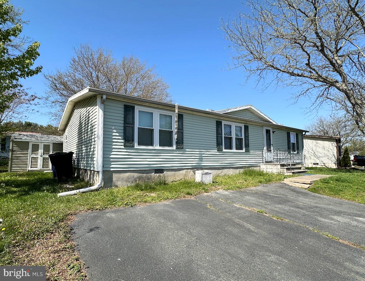19 Gordon Drive Dover, DE 19901 - Photo 2 of 19 a front view of a house with a yard