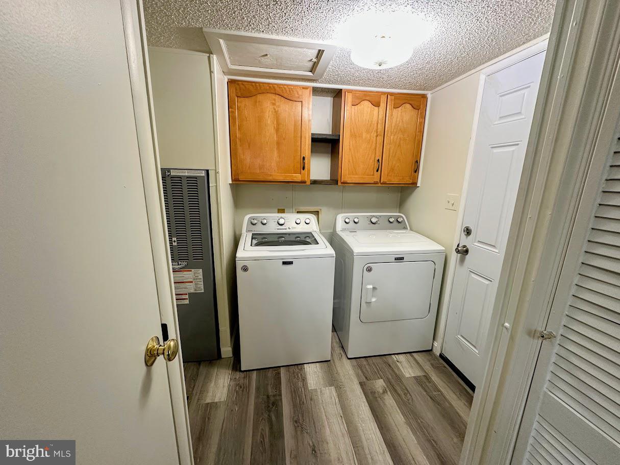 19 Gordon Drive Dover, DE 19901 - Photo 9 of 19 a utility room with wooden floor washer and dryer