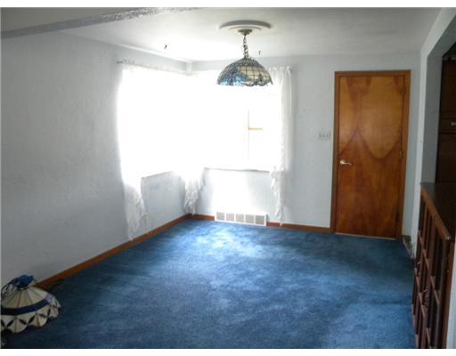 Dining Room. Dining Room With Corner Window And Built Ins