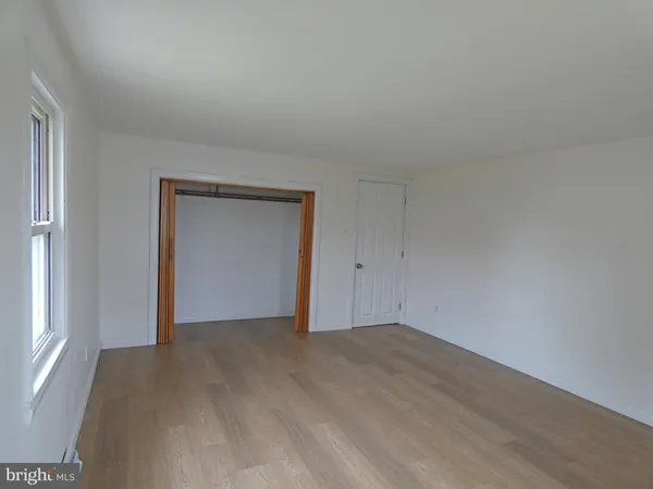 an empty room with window