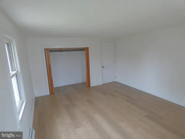 an empty room with window