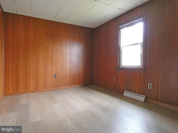 a bathroom with a sink a vanity and mirror