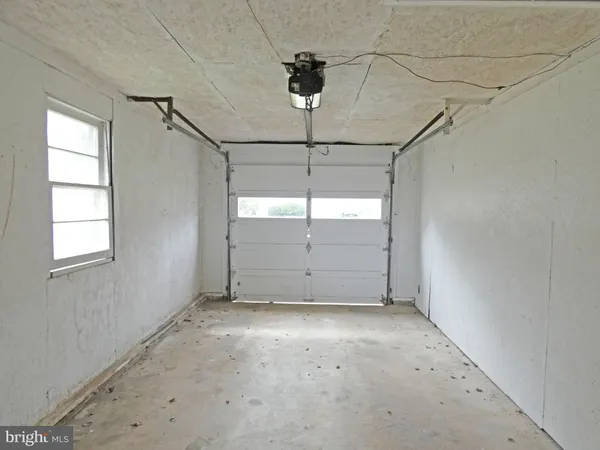 a view of porch with large trees