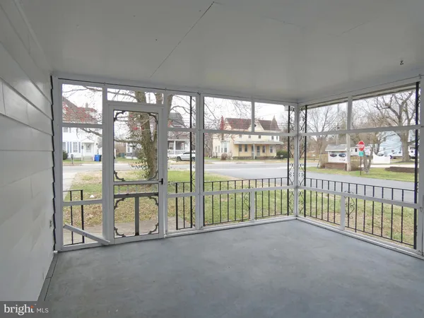 a view of a porch and a yard