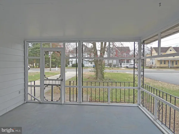 a house with trees in the background