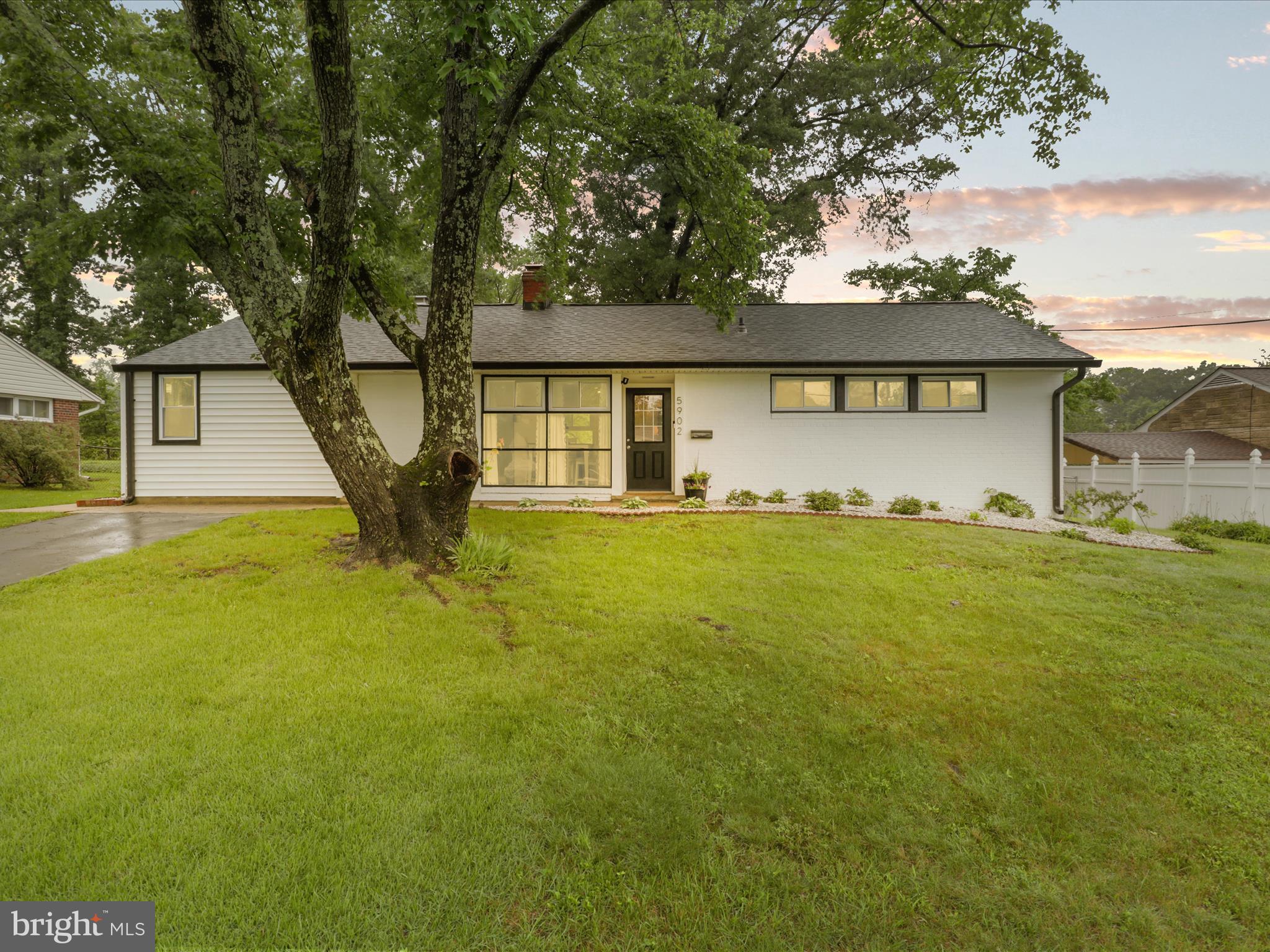5902 Amelia Street Springfield, VA 22150 - Photo 1 of 15 a front view of a house with yard