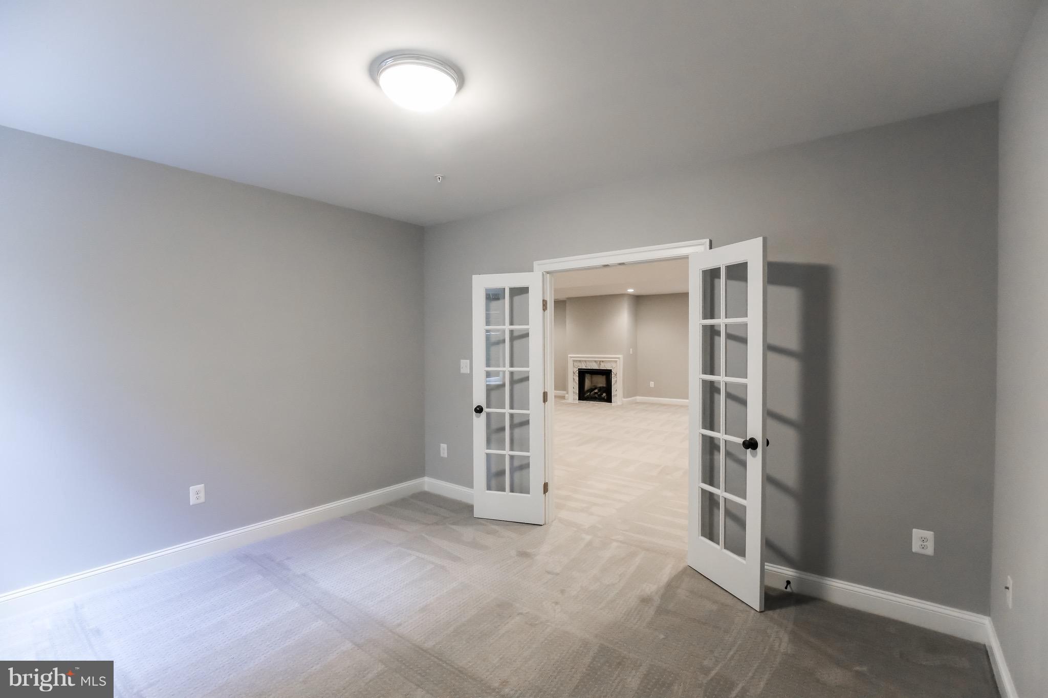 8813 Ridge Road Bethesda, MD 20817 - Photo 23 of 30 an empty room with closet and windows