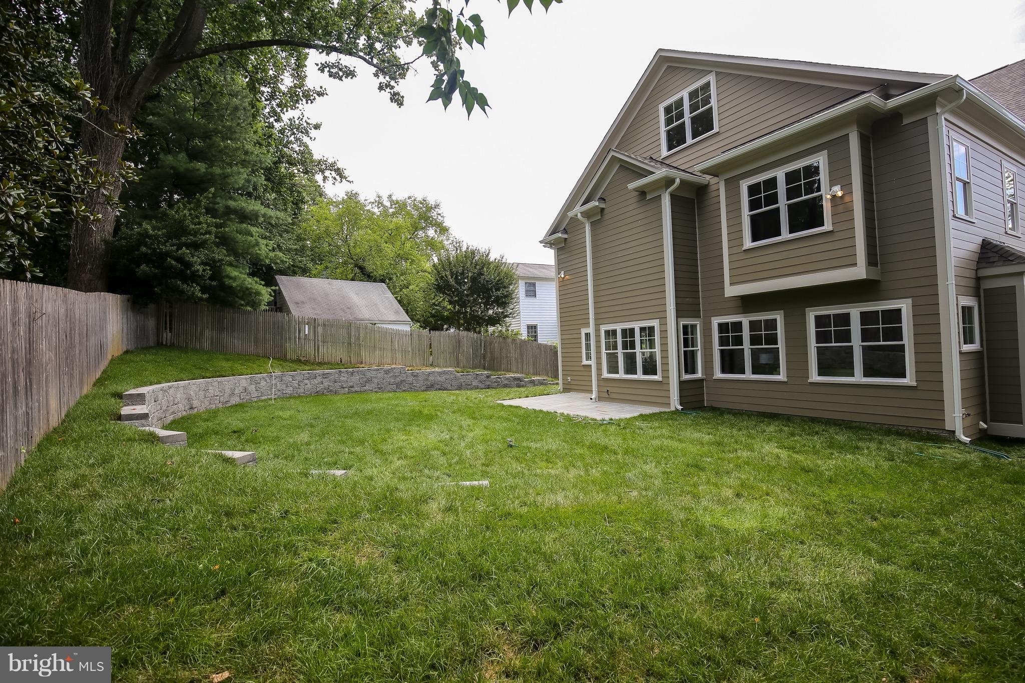 8813 Ridge Road Bethesda, MD 20817 - Photo 26 of 30 a backyard of a house with lots of green space