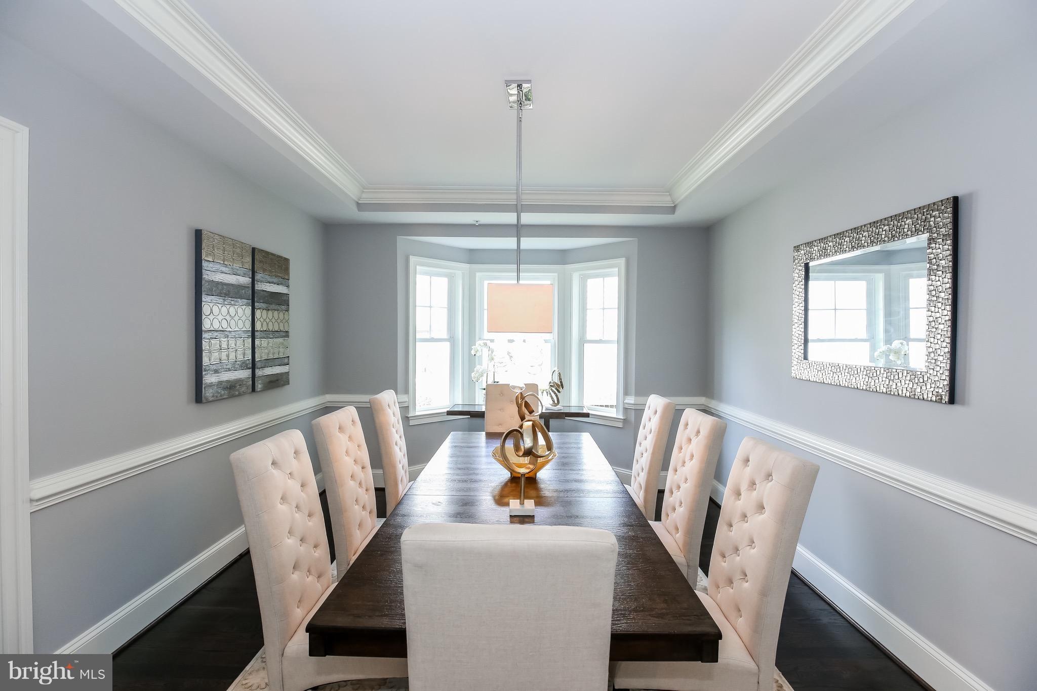 8813 Ridge Road Bethesda, MD 20817 - Photo 5 of 30 a view of a dining room with furniture window and wooden floor