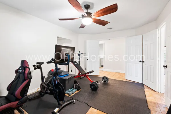 a view of a room with gym equipment