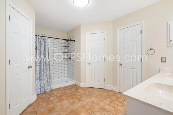 a view of a bathroom with a shower