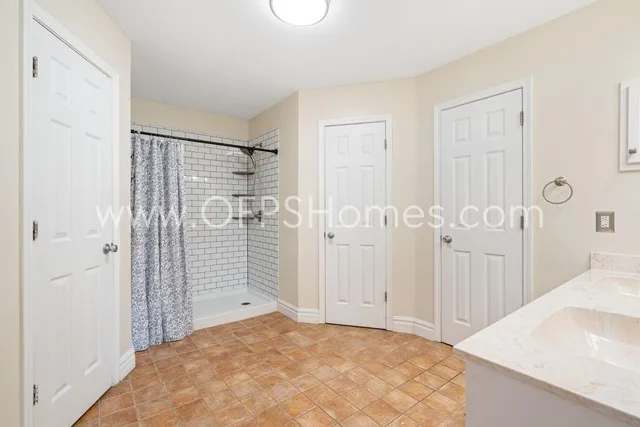 a view of a bathroom with a shower