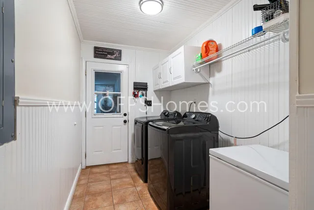 a front view of a house with glass windows