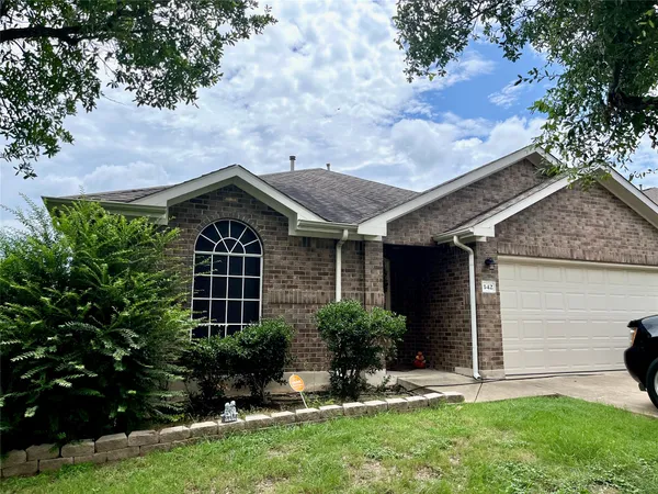 a view of house with yard and entertaining space