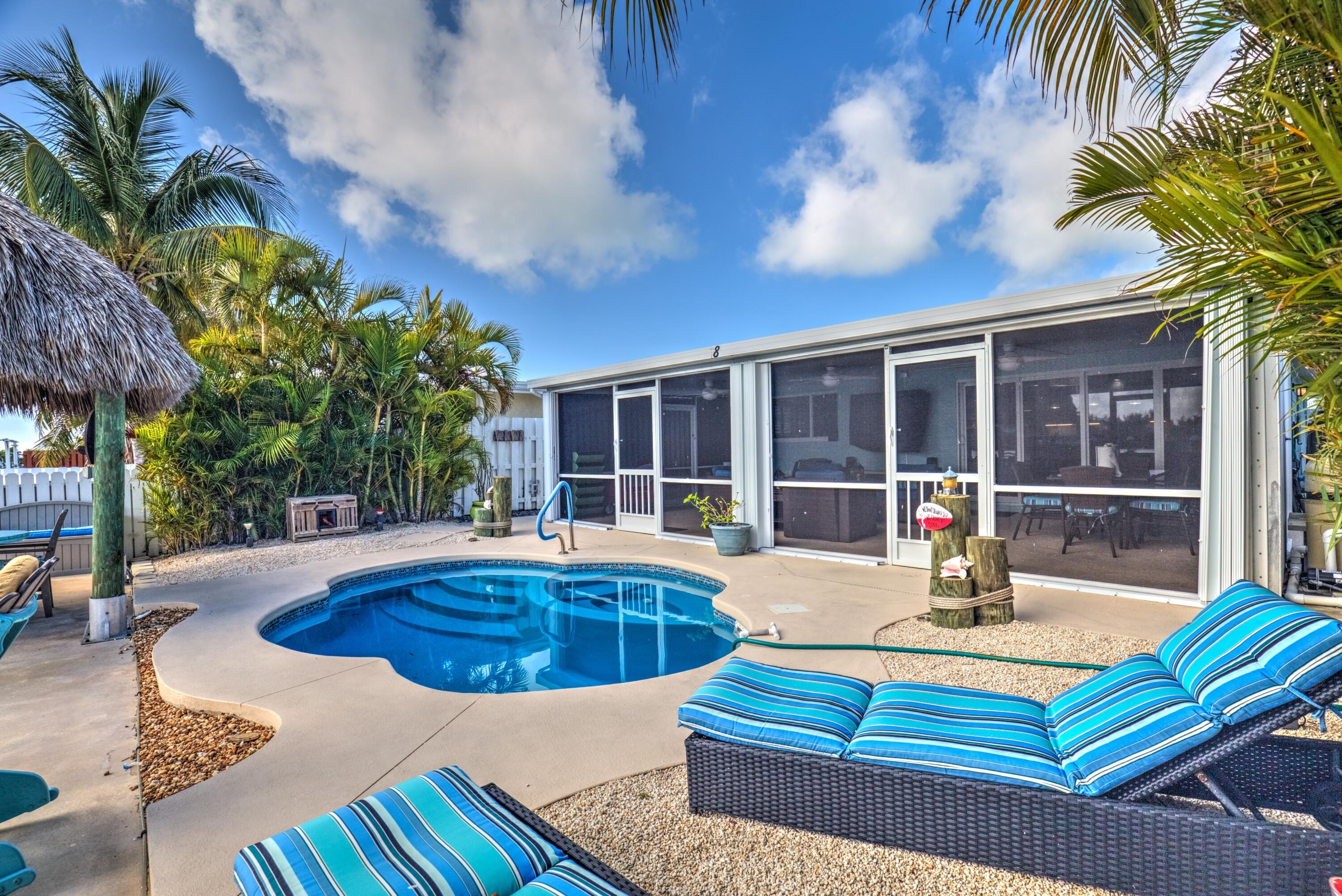 8 Sadowski Key Key Colony Beach, FL 33051 - Photo 1 of 57 a view of outdoor space with swimming pool and patio