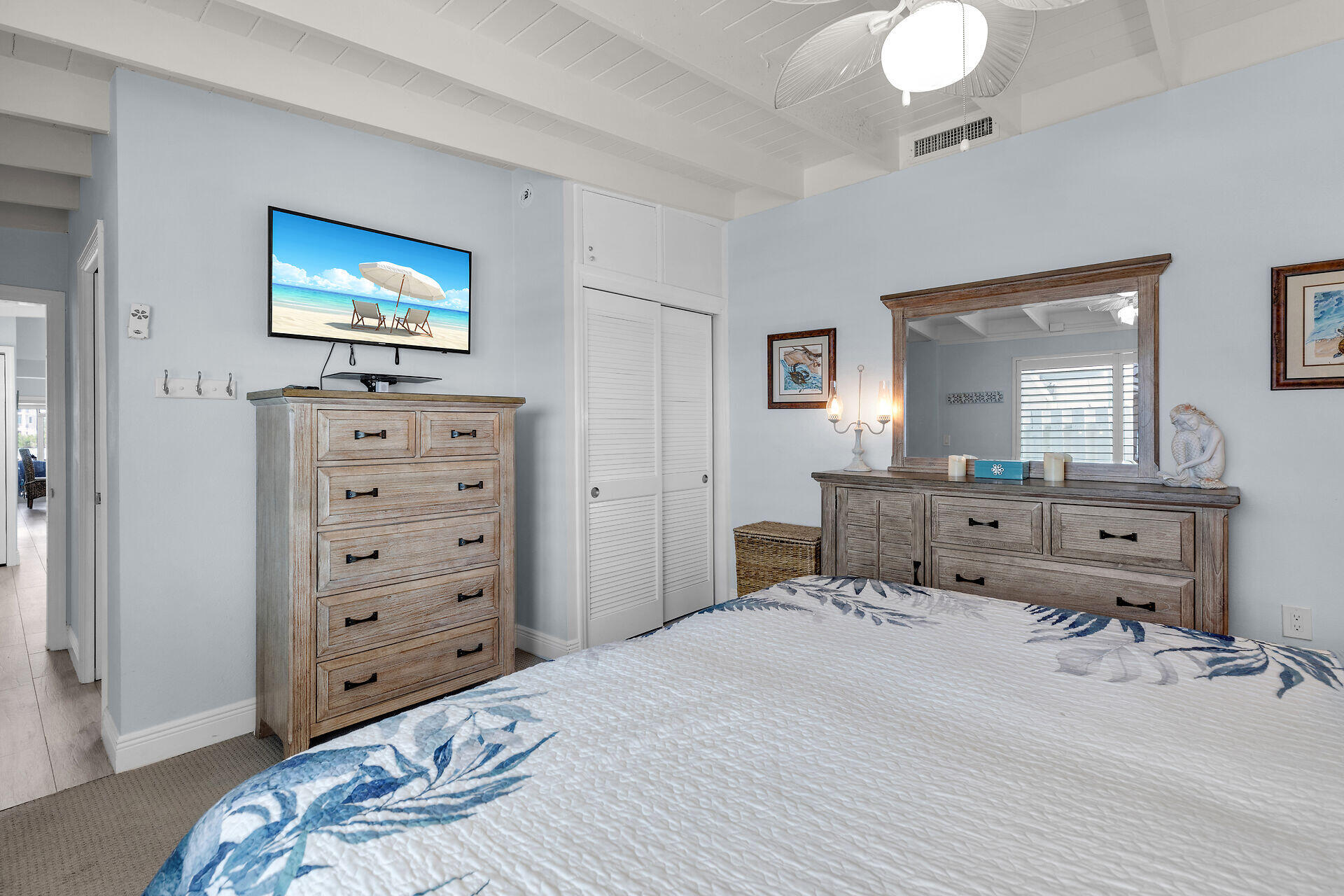 8 Sadowski Key Key Colony Beach, FL 33051 - Photo 13 of 57 a bedroom with a bed and a mirror