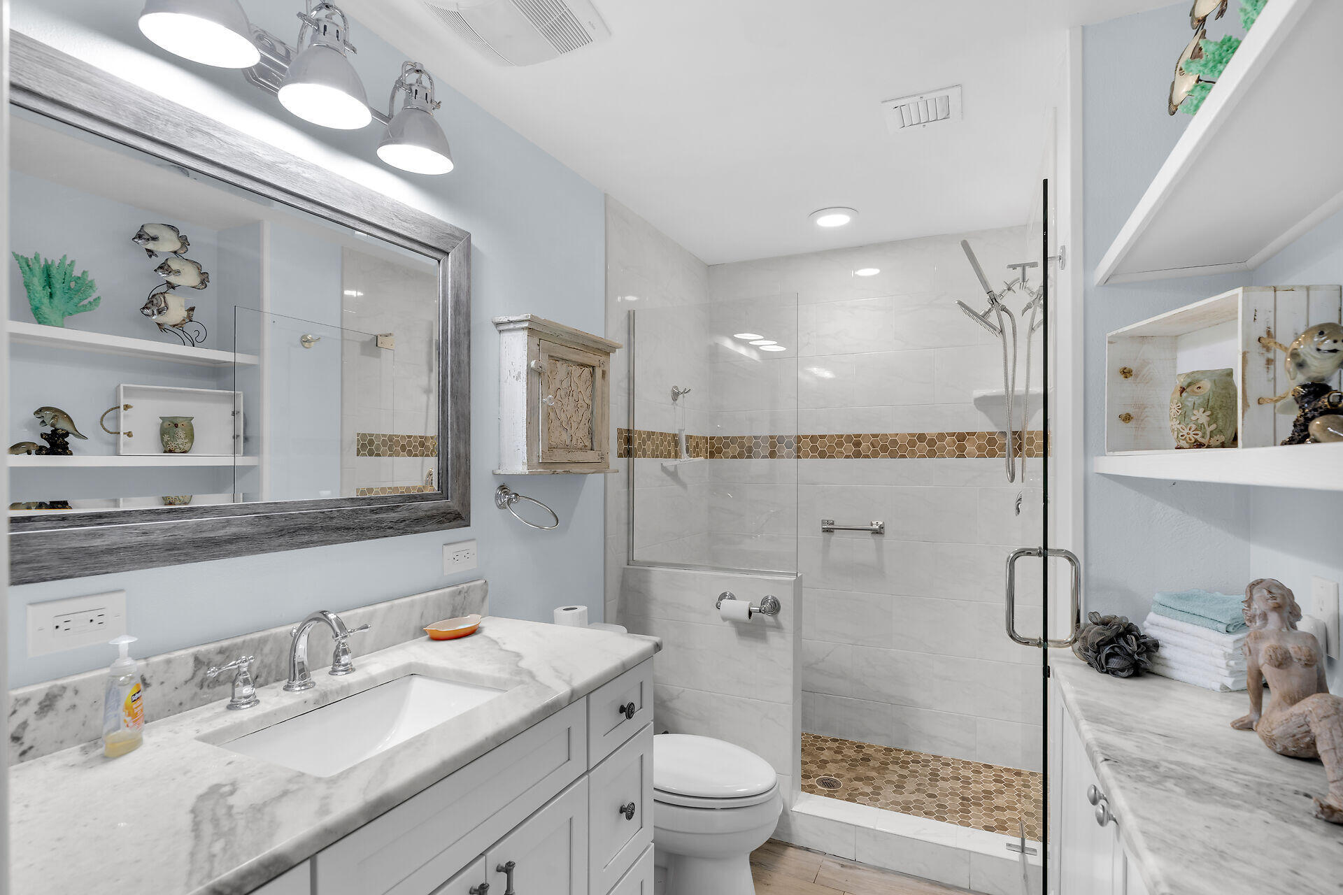 8 Sadowski Key Key Colony Beach, FL 33051 - Photo 15 of 57 a bathroom with a granite countertop sink toilet and shower