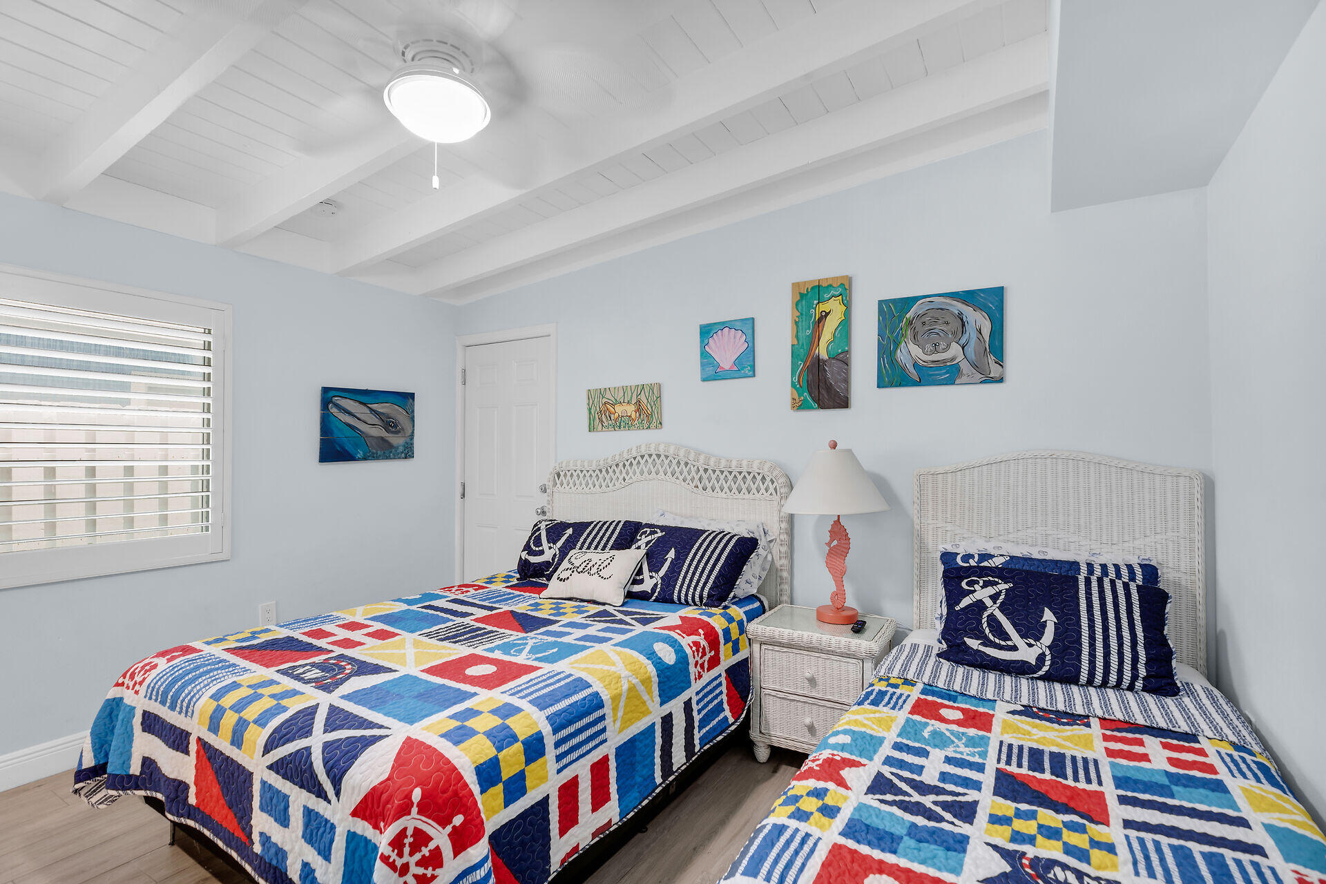 8 Sadowski Key Key Colony Beach, FL 33051 - Photo 19 of 57 a bedroom with a bed and a couch