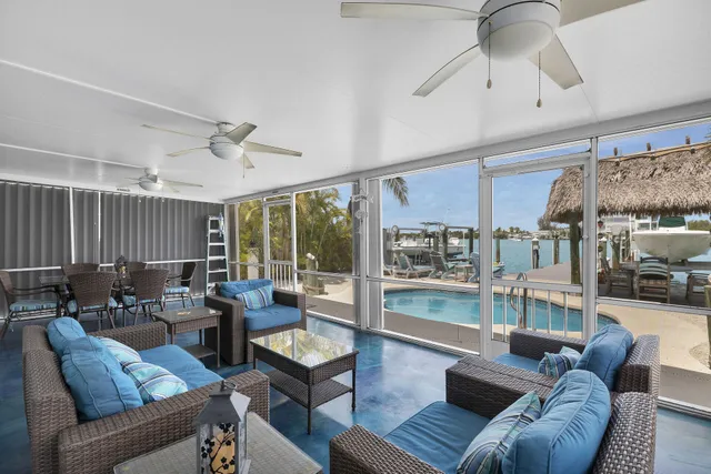 a view of a swimming pool with a patio