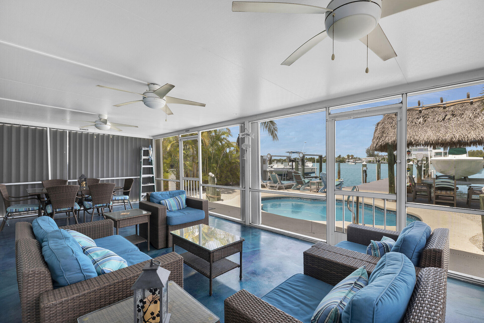 8 Sadowski Key Key Colony Beach, FL 33051 - Photo 23 of 57 a living room with furniture and a large window