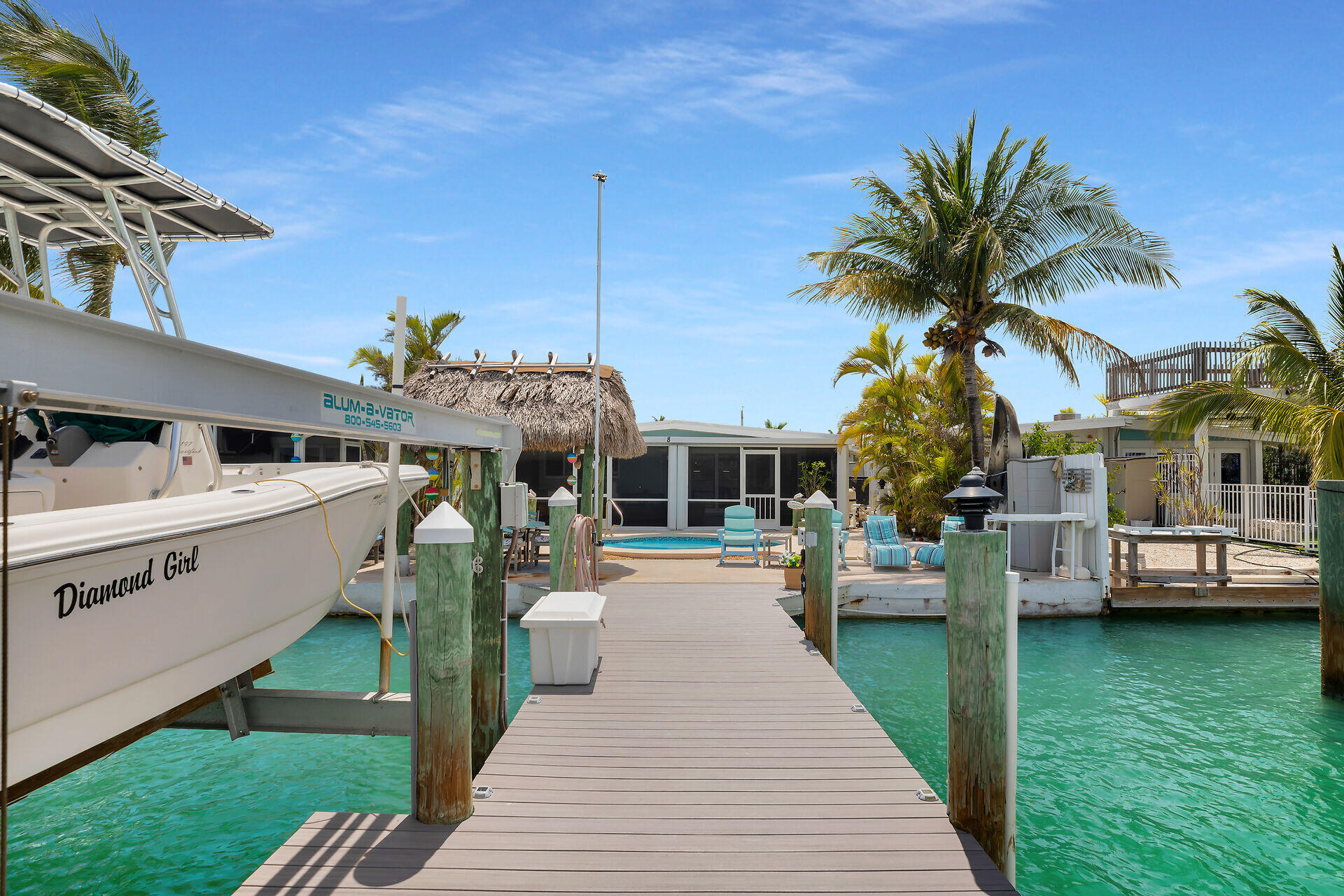 8 Sadowski Key Key Colony Beach, FL 33051 - Photo 27 of 57 a view of a house with a swimming pool