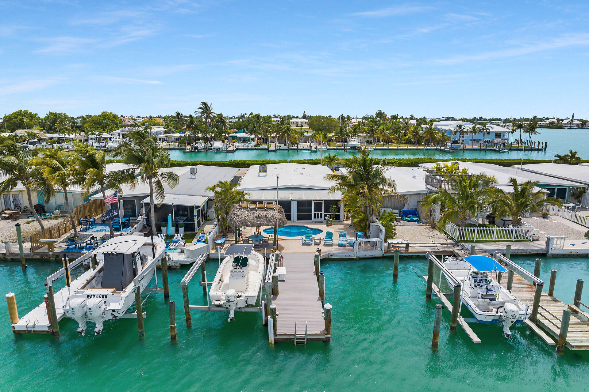 8 Sadowski Key Key Colony Beach, FL 33051 - Photo 37 of 57 a view of a lake with lawn chairs