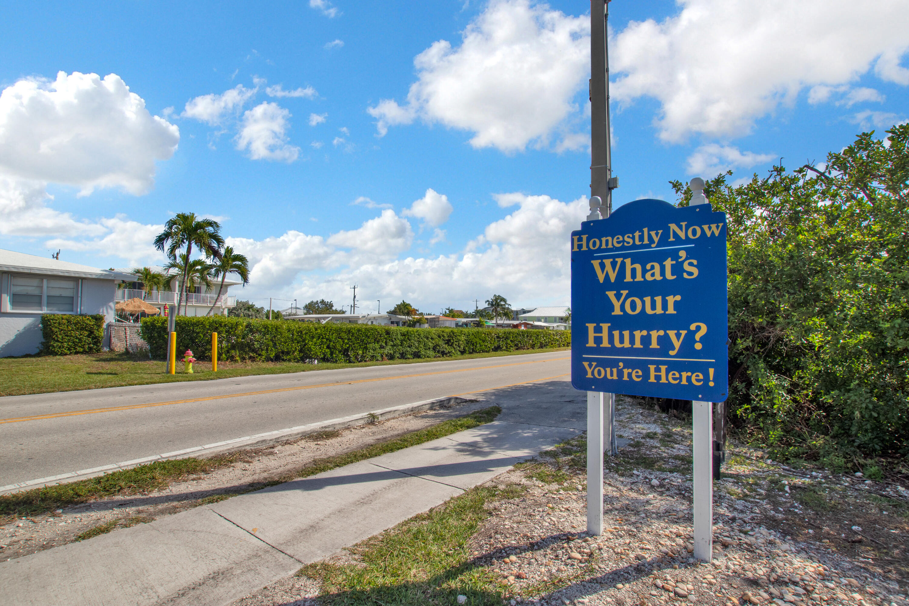 8 Sadowski Key Key Colony Beach, FL 33051 - Photo 45 of 57 a sign board with street view in the background