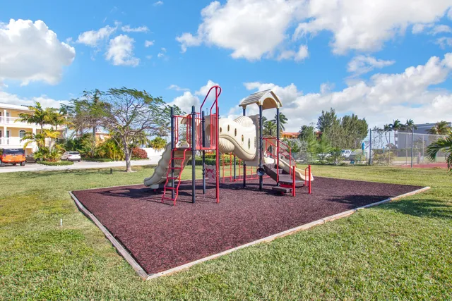a view of a food mall next to a yard