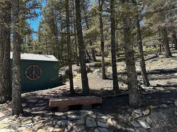 a sign board with a yard