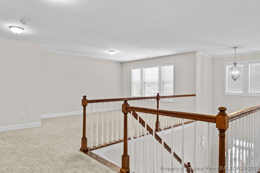 252 School Side Drive Spring Lake, NC 28390 - Photo 14 of 35 a view of an empty room with stairs