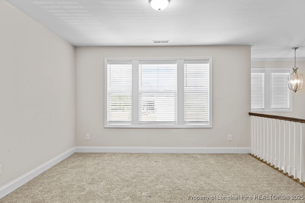 252 School Side Drive Spring Lake, NC 28390 - Photo 16 of 35 an empty room with a window