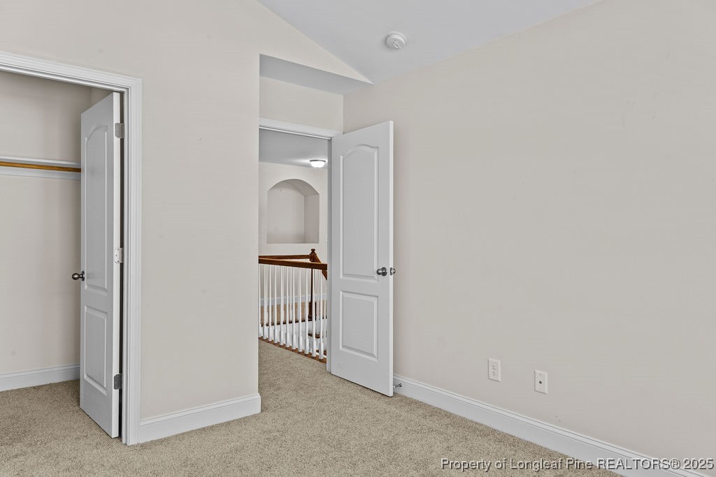 252 School Side Drive Spring Lake, NC 28390 - Photo 18 of 35 a view of a room with a wardrobe space
